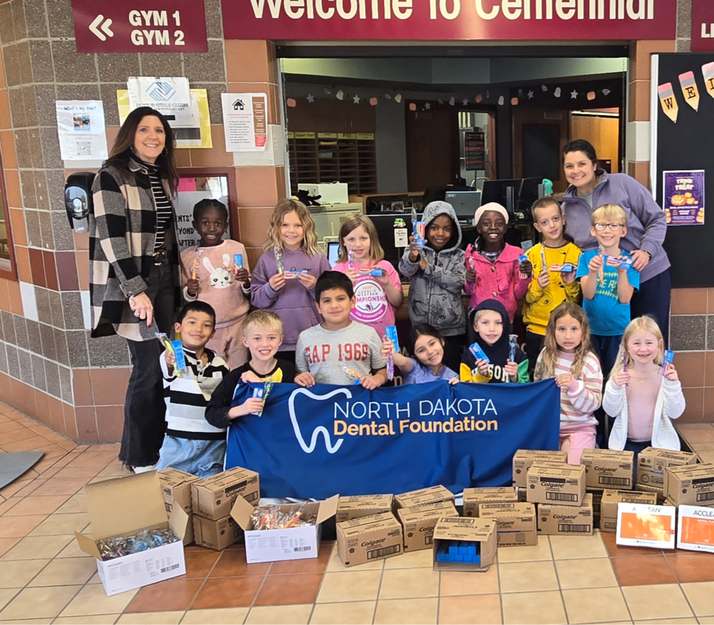 Donating dental supplies at Centennial Elementary School - Fargo, ND