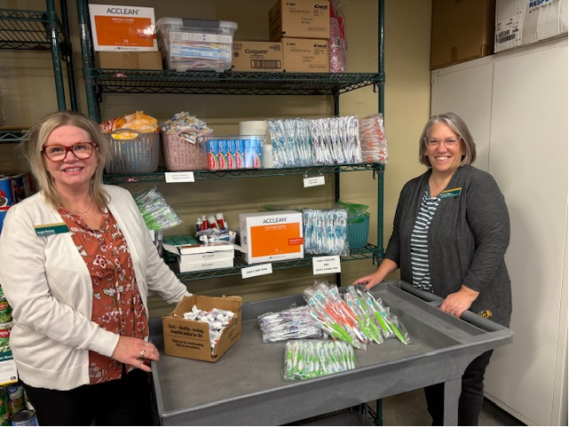 Donating dental supplies at NDSU Goods for the Herd Food Pantry - Fargo, ND